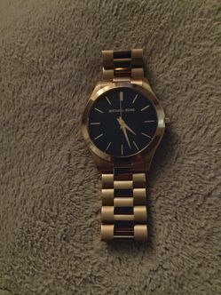 Gold men's Michael Kors watch