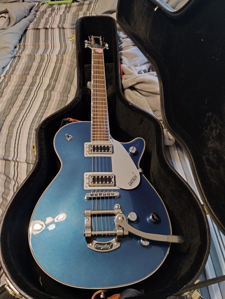 GRETSCH Guitar With Hard Case.  $495