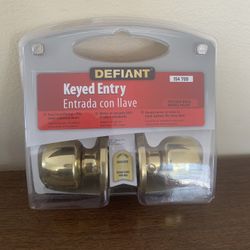Defiant Keyed Entry Goldtone Door Knob - 2 KEYS - MDL.# 154 709 - SEALED - NEW