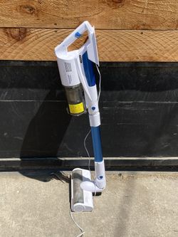 Battery operated white vacuum