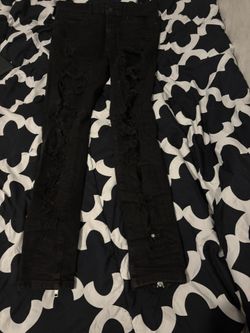 Black distressed skinny jeans 
