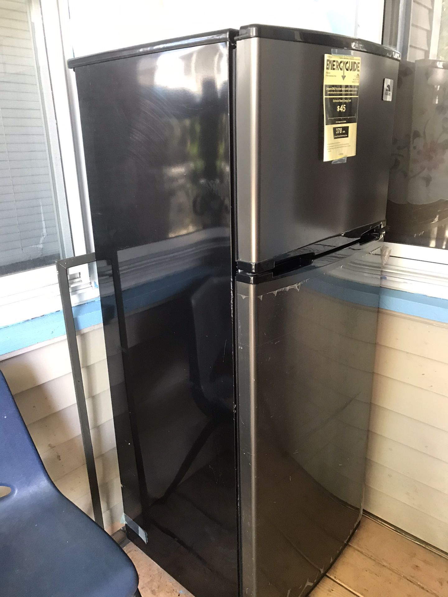 Refrigerator like new I use one month only size 21”wide x56 tolled