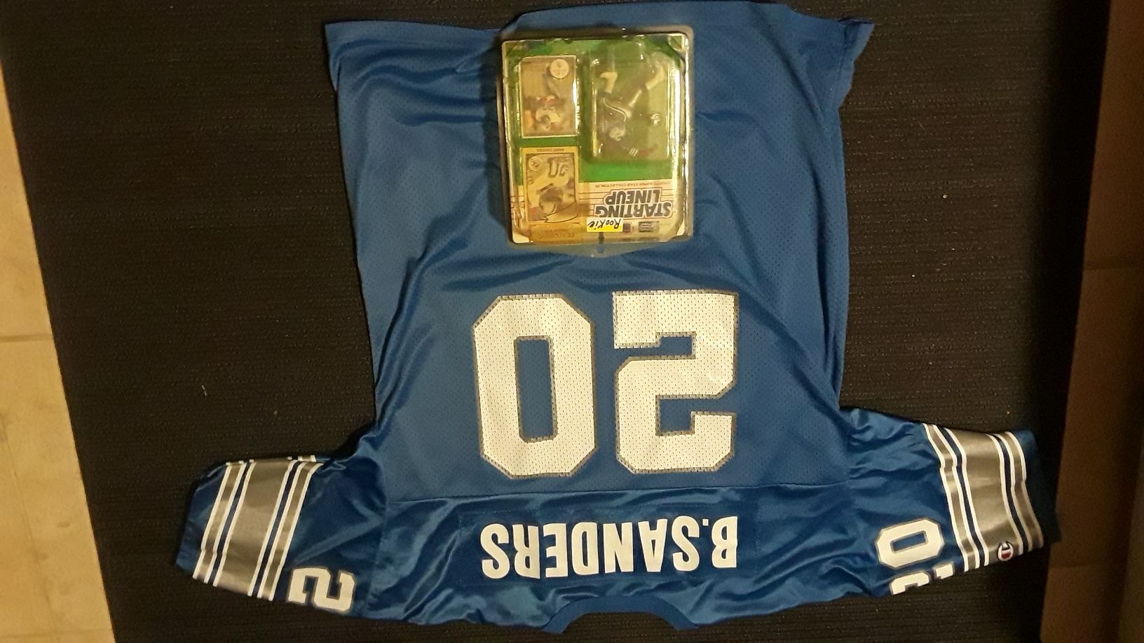 champion apperal barry sanders jersy /w1990 starting line up sports superstars collectables action figure and rookie card never opened