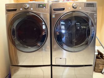 LG he Electric Front Load Washer and Dryer w/ Pedestals