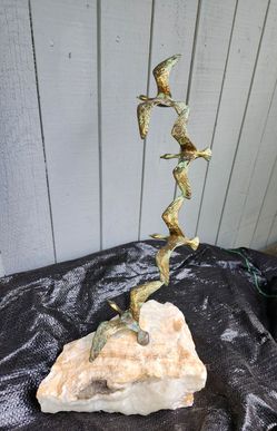 Brass flying geese sculpture