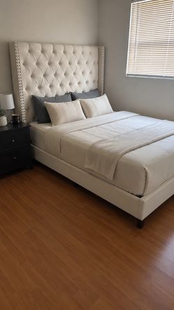 Upholstered queen bed frame