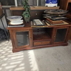 A Wooden  Coffee Table With Glass3 Doors