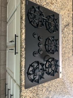 Refrigerator, Double Oven, Gas Cooktop. All like new condition and as clean as new