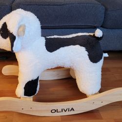 OLIVIA, BRANDED CUTE ROCKING DOG FOR CUTE KIDS. EXCELLENT CONDITION, SLIGHTLY USED $30
