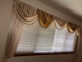 Gold drapes already put together, easy to hang!