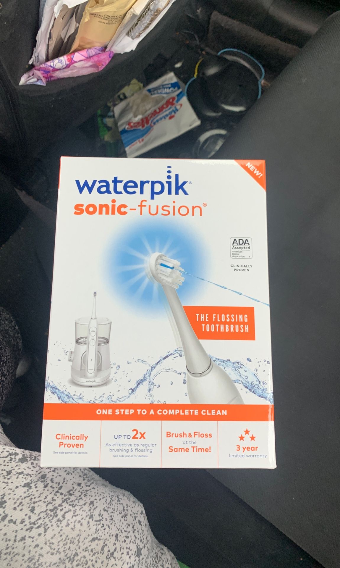 Water pick sonic fusion water flossing toothbrush