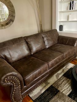 Leather couch with ottoman