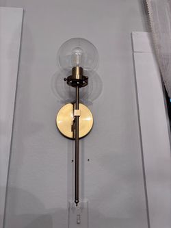 2 battery operated brass sconces