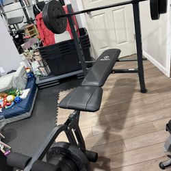 Weight Bench With 125lbs Of Weights 