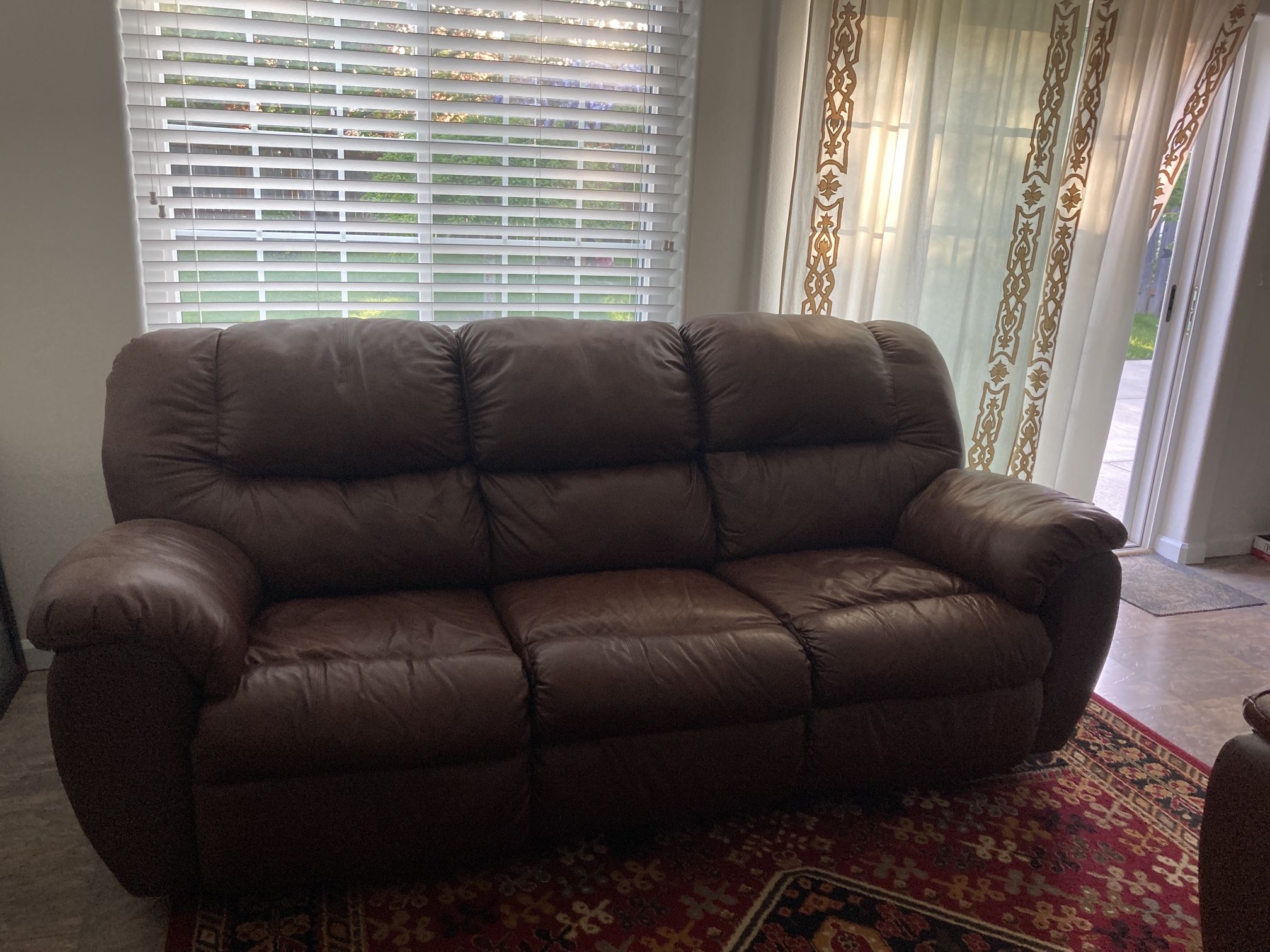 Faux leather sofa and loveseat/ recliner - Dark Brown