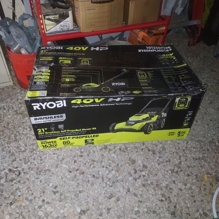 RYOBI
Was-
40V HP Brushless 21 in.
Cordless Battery Walk Behind
Self-Propelled Lawn Mower
with (2) 6.0 Ah Batteries and
Charger