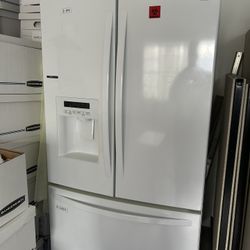 Two-door refrigerator with bottom freezer drawer