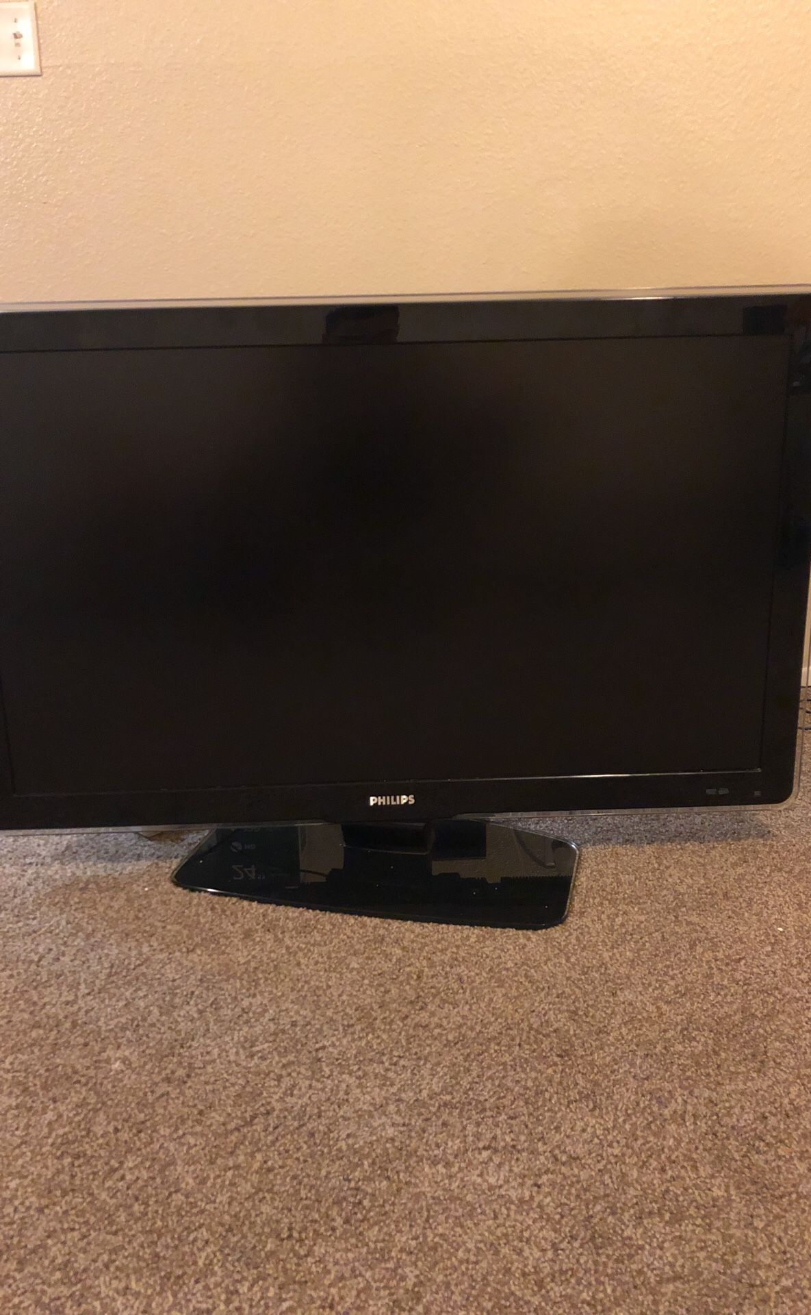 60 inch Philips flat screen tv with tv protector