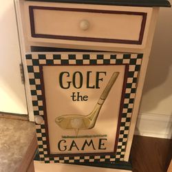 Golf cabinet in chess board with little wooden chess pieces