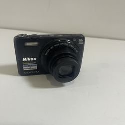 Nikon Coolpix S7000 16MP WiFi Digital Camera Read