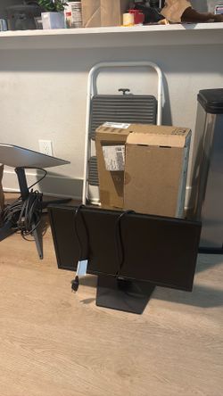 2 dell desktops with keyboard