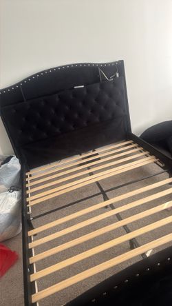 Queen bed frame with shelf and led lights lightly used