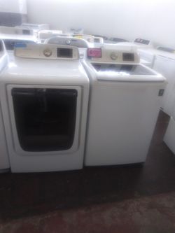 Samsung top load washer and dryer set working perfectly with 4 months warranty