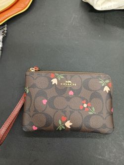 A coach tiny hand purse