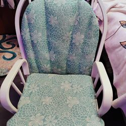 White Rocker And Floral Cushion