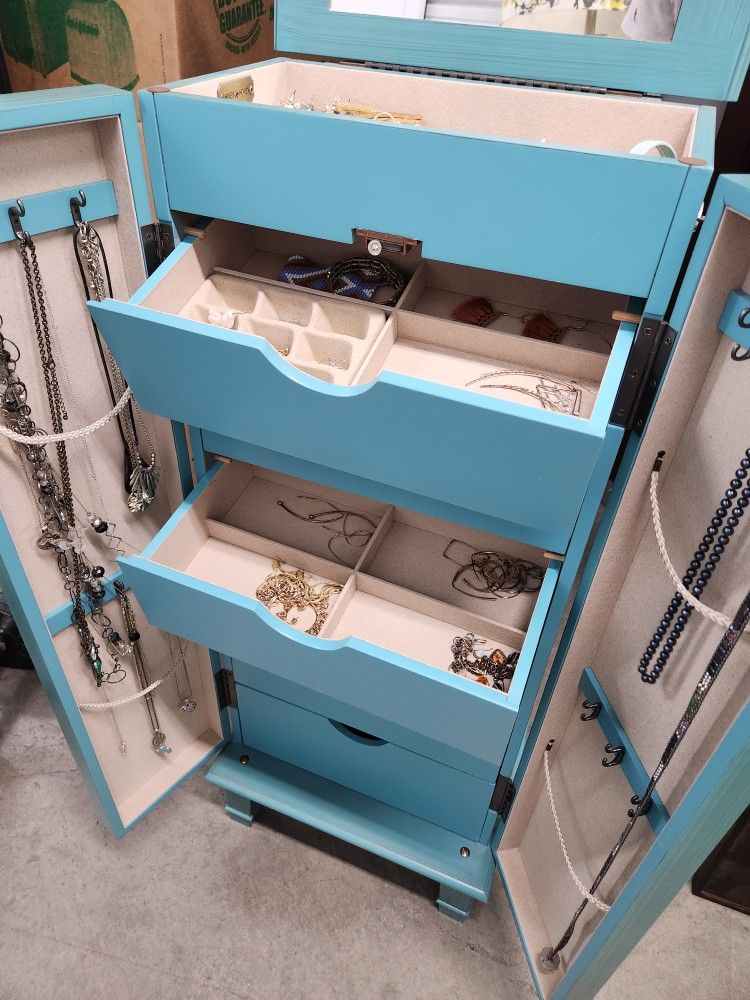 Turquoise jewelry armoire deals