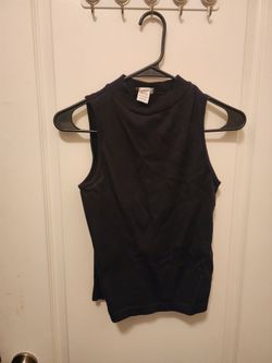 black Nine West sleeveless ribbed mock-neck sweater features