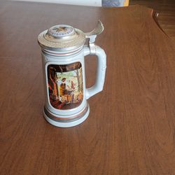 Avon Lidded Beer Stein The Building of America Collection The Blacksmith 
8.5". Vintage. Please see the photos.
1985 beer stein titled "The Blacksmith