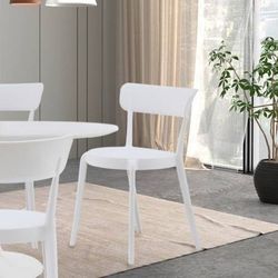 10, white bistro chairs. $45 each