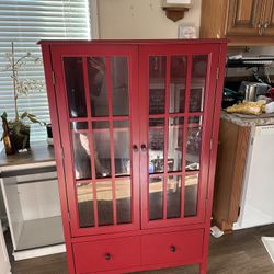 Red Target glass cabinet