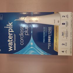 Brand new !!  Waterpik cordless plus . Factory sealed!