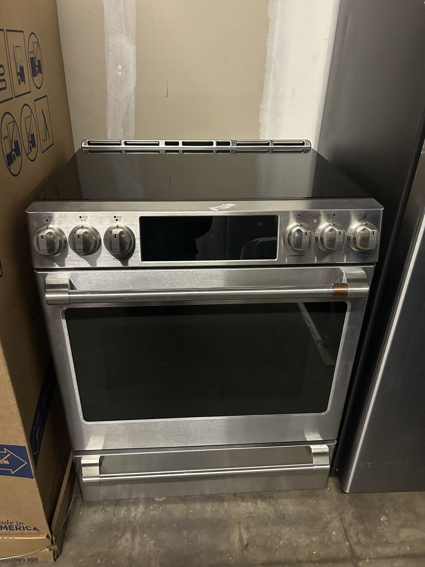 CAFÉ SLIDE IN ELECTRIC STOVE!!! AIR FRYER!!! CONVECTION OVEN!!! STAINLESS STEEL BRAND NEW OPEN BOX!!!!