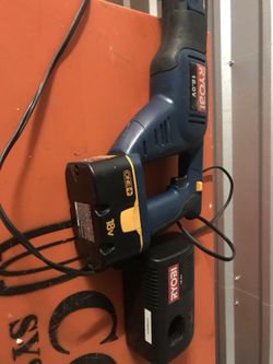 Ryobi Saw sall with charger and battery ..