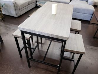 Grey top table with 4 stools