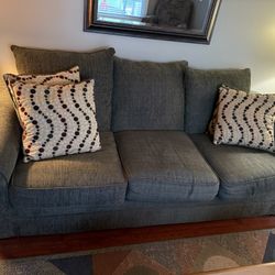 Green Sofa With Pillows 