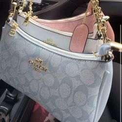 Blue,pink,and White Coach Bags