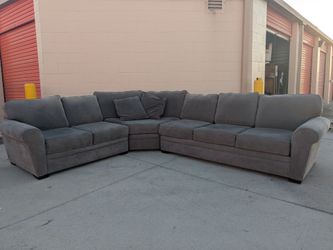 Large Gray Sectional Sofa with Throw Pillows