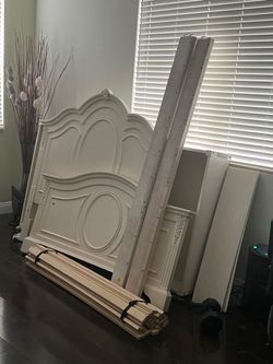 Cream bedroom set- full bed with trundle,dresser, chest and armoire