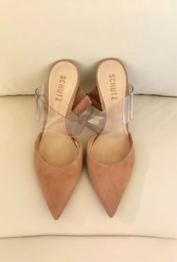 Sionne Clear Strap Pointed Toe Mule from the luxury footwear brand Schutz. Its avant-garde design combines classic elegance with modern details. Size 