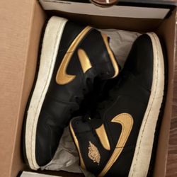 Gold and black Jordan
