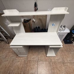 It’s a Desk With 3 Drawers It’s White Big And Strong 