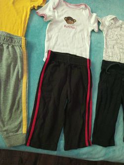 4 Onesies Size 9 &12 Months 4 Pants 