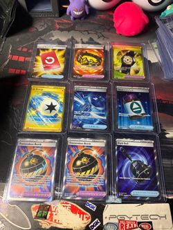 Pokémon Trainer Card Lot – 9 Holographic Cards