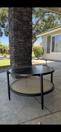 Black And Rattan Circular Coffee Table