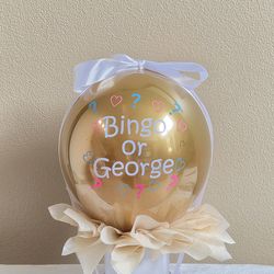Gender reveal popping balloon
