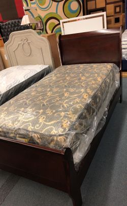 New Ashley twin bed complete with mattress and box